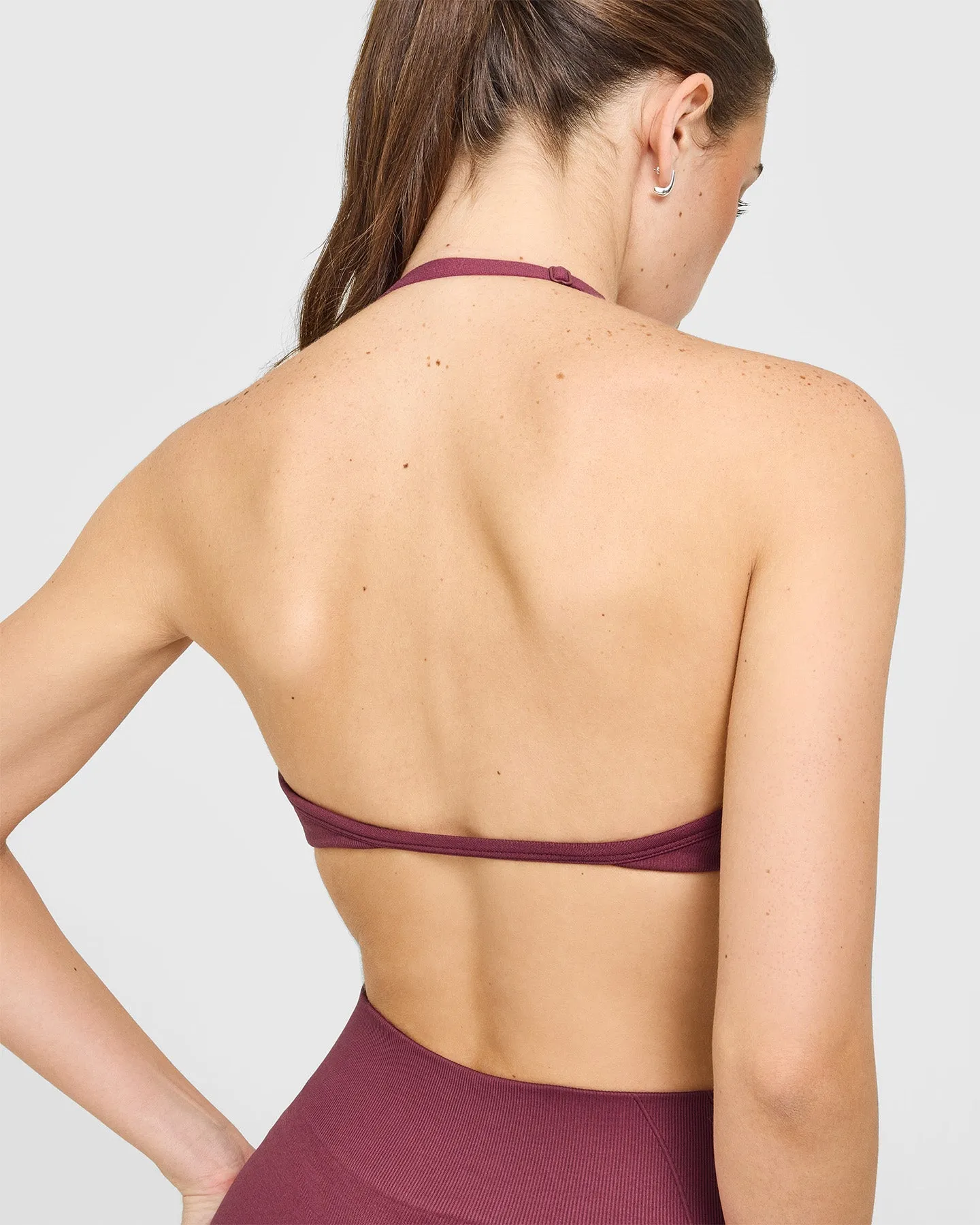 EnhanceLift™ Seamless Minimal Halter Neck Bralette with White Logo | Burnt Maroon sold by Oner Active product image thumbnail 5