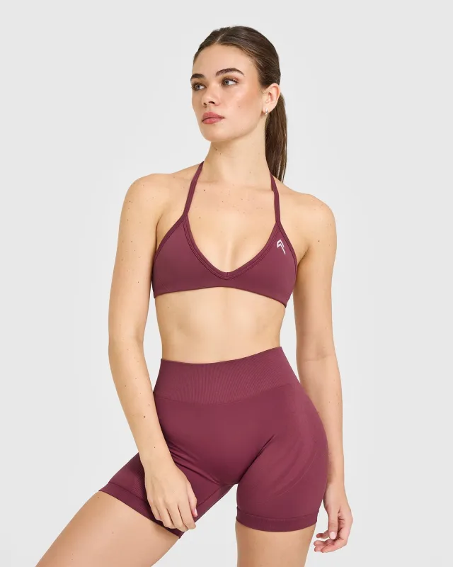 EnhanceLift™ Seamless Minimal Halter Neck Bralette with White Logo | Burnt Maroon sold by Oner Active