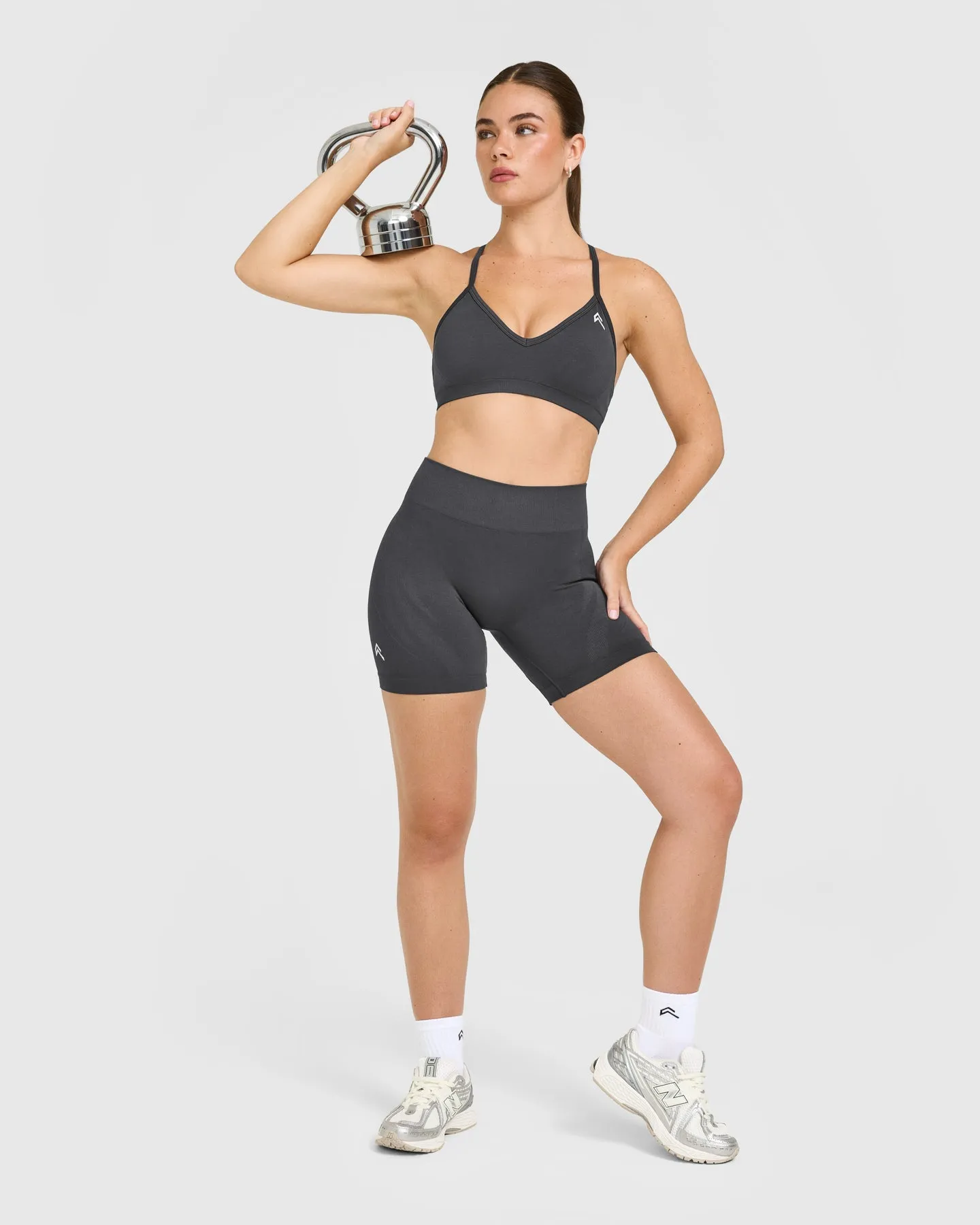 EnhanceLift™ Seamless Strappy Sports Bra with White Logo | Coal sold by Oner Active product image thumbnail 3