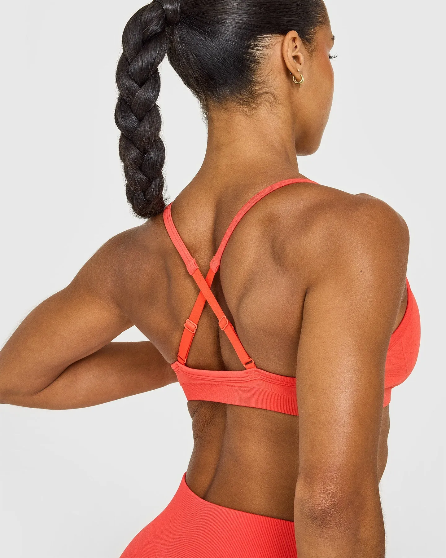 EnhanceLift™ Seamless Strappy Sports Bra with White Logo | Charged Coral sold by Oner Active product image thumbnail 4