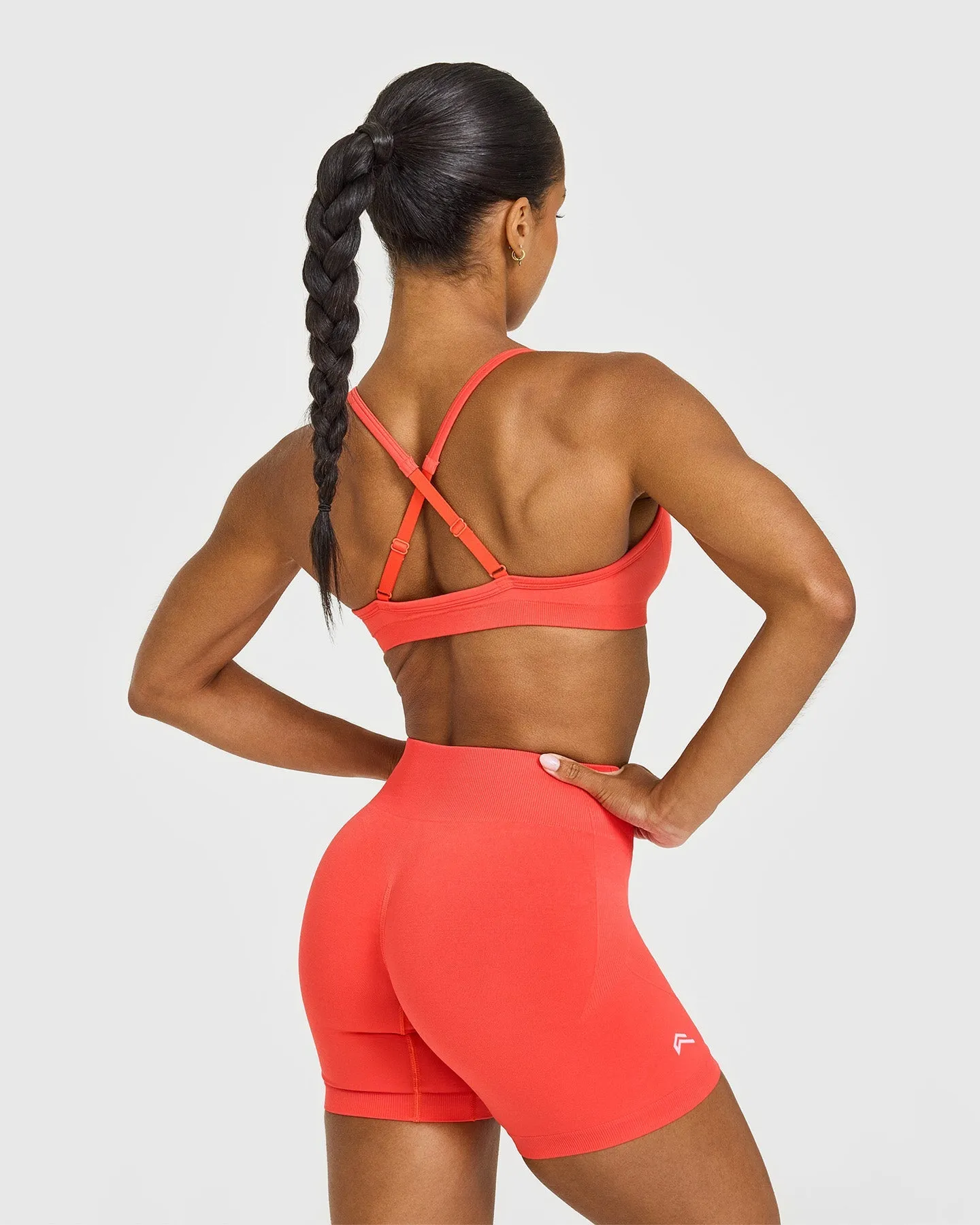 EnhanceLift™ Seamless Strappy Sports Bra with White Logo | Charged Coral sold by Oner Active product image thumbnail 2