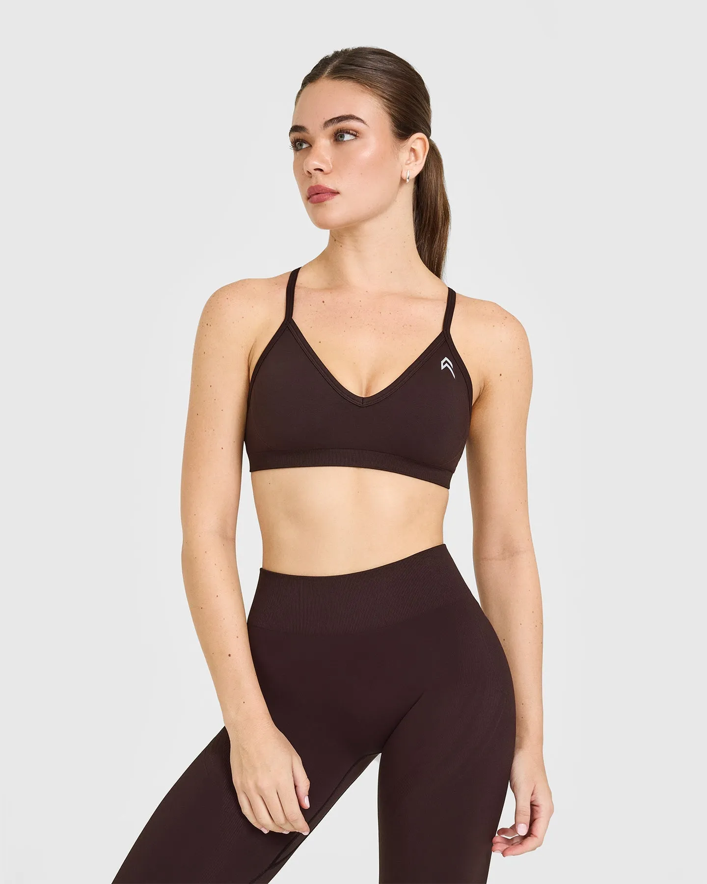 EnhanceLift™ Seamless Strappy Sports Bra with White Logo | Plum Brown sold by Oner Active