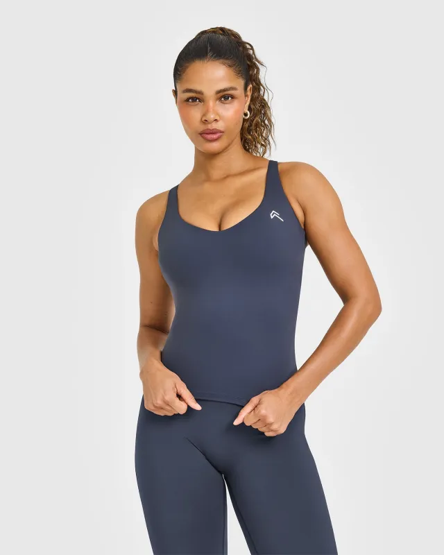 Unified V Neck Cross Back Vest White Logo | True Blue sold by Oner Active