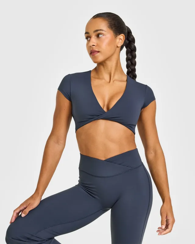 Unified Twist Front Short Sleeve Crop Top | True Blue sold by Oner Active