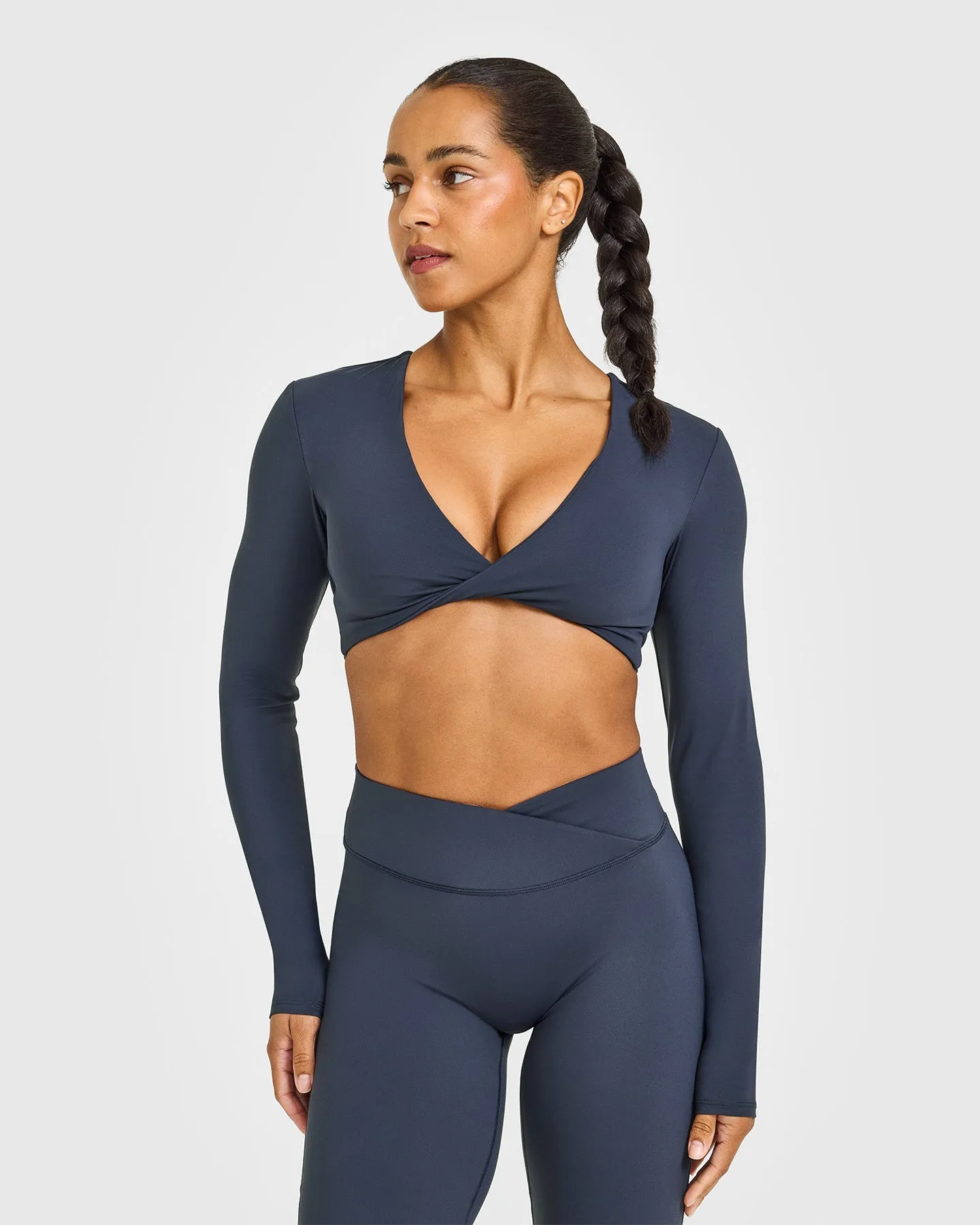 Unified Twist Front Long Sleeve Crop Top | True Blue sold by Oner Active
