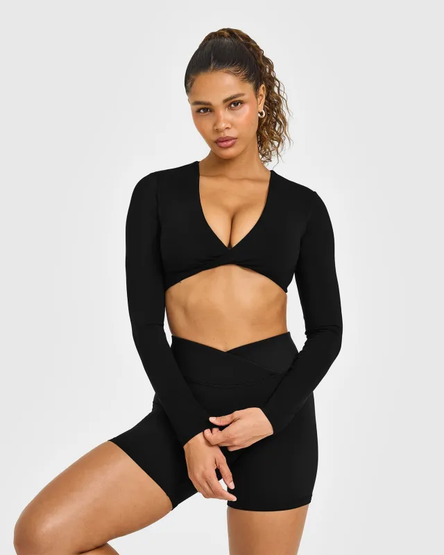 Unified Twist Front Long Sleeve Crop Top White Logo | Black sold by Oner Active