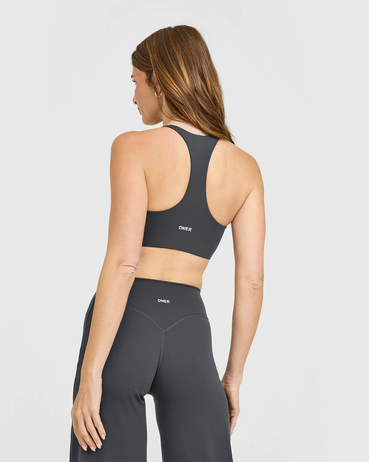 SoftMotion™ Sports Bra with White Logo | Coal sold by Oner Active product image thumbnail 4