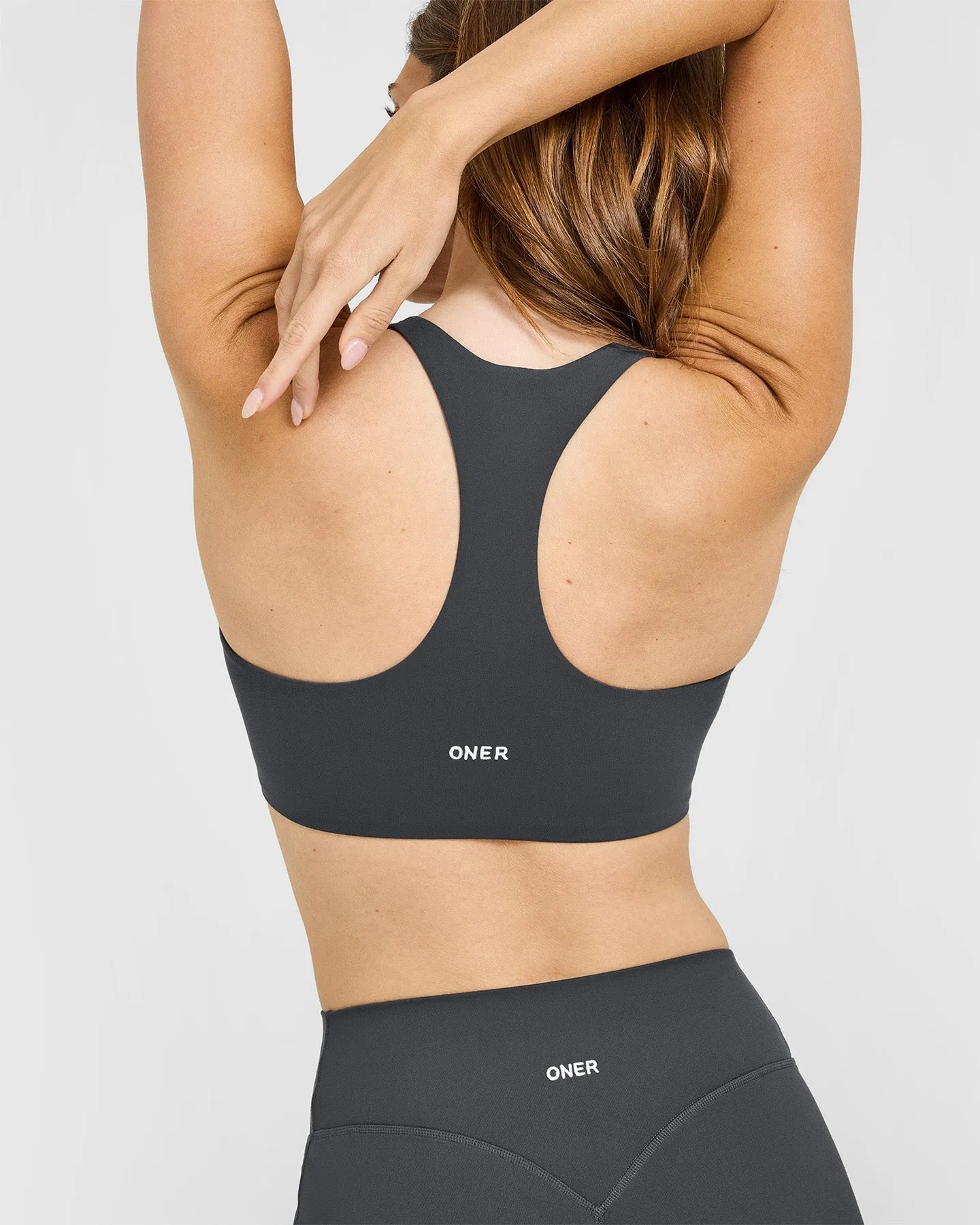 SoftMotion™ Sports Bra with White Logo | Coal sold by Oner Active product image thumbnail 2
