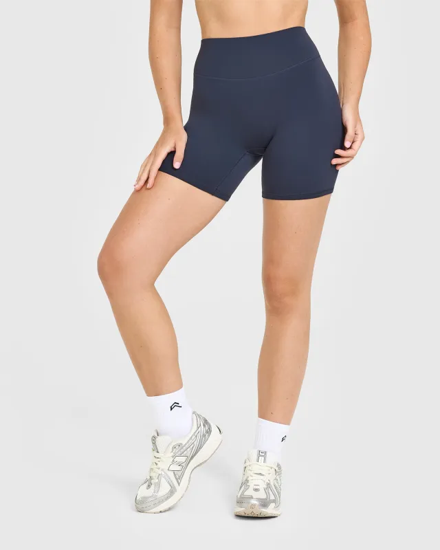 SoftMotion™ High Waisted Shorts 6" with White Logo | True Blue sold by Oner Active