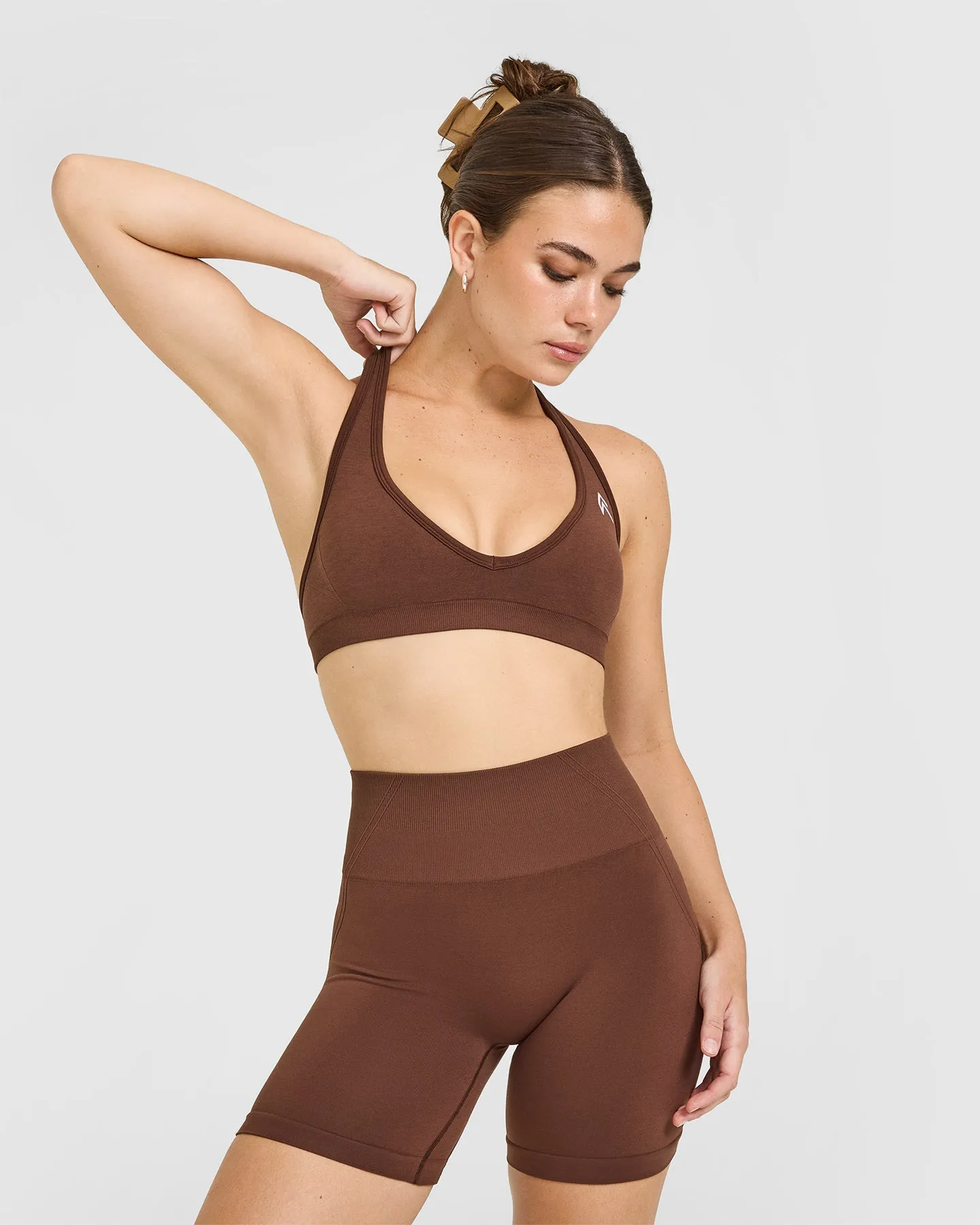 Effortless Seamless Halter Neck Sports Bra with White Logo | Rustic Brown sold by Oner Active