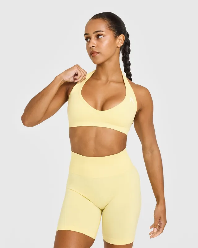 Effortless Seamless Halter Neck Sports Bra with White Logo | Sherbert Yellow sold by Oner Active