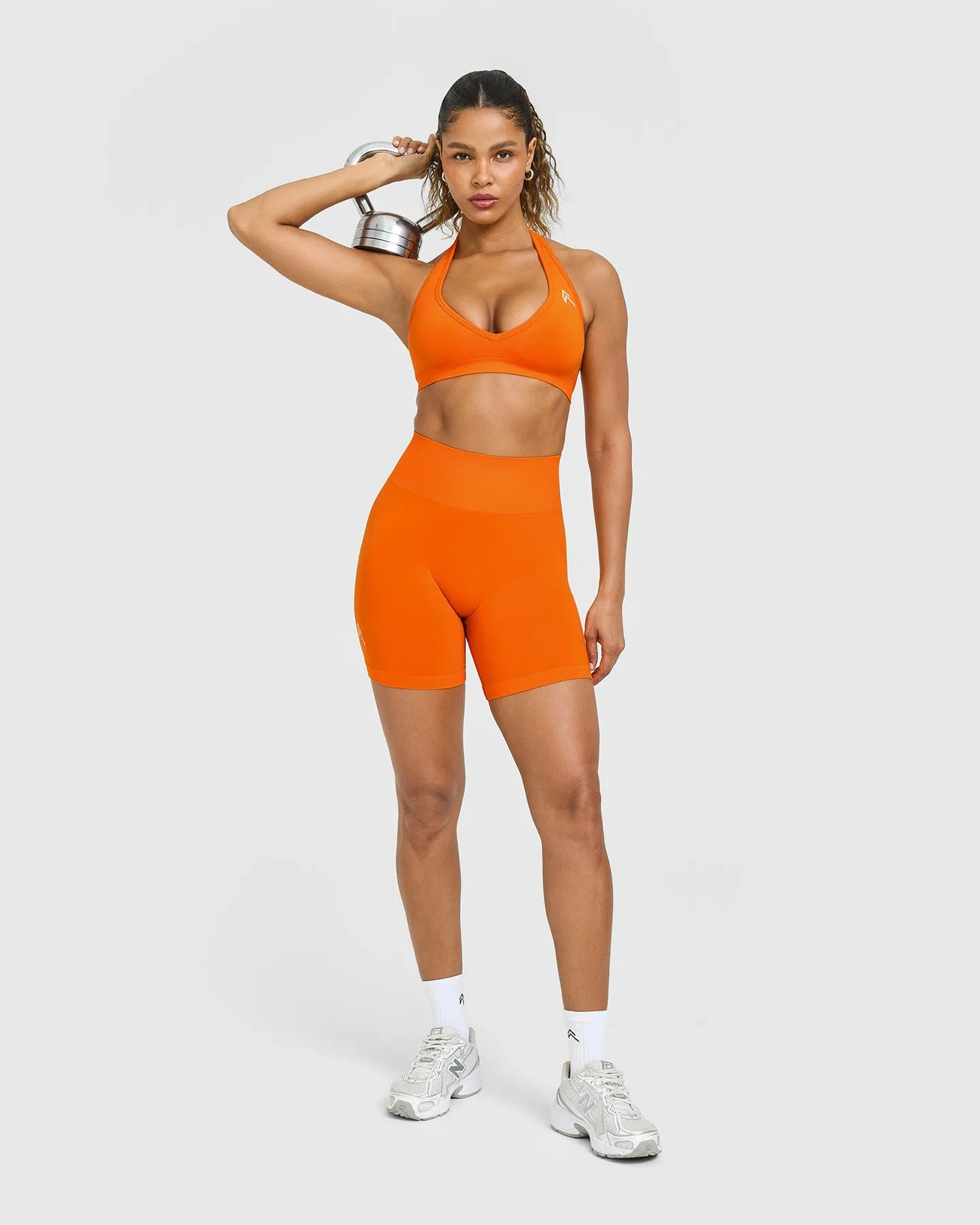 Effortless Seamless Halter Neck Sports Bra with White Logo | Flame Orange sold by Oner Active product image thumbnail 3