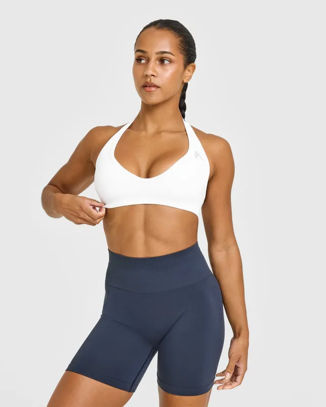Effortless Seamless Halter Neck Sports Bra with White Logo | White sold by Oner Active