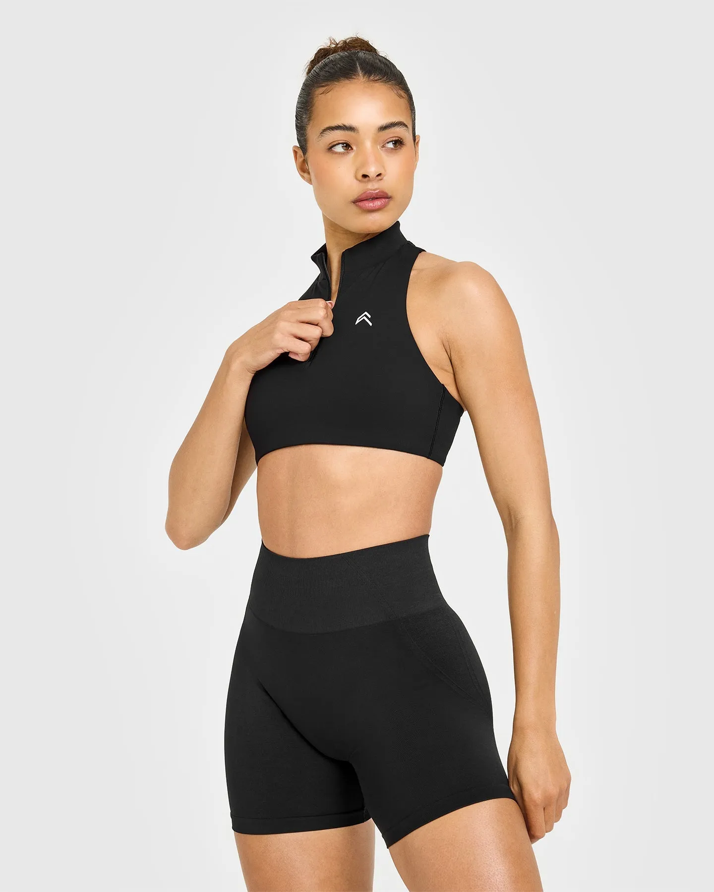 EasyLift™ Zip High Neck Sports Bra with White Logo | Black sold by Oner Active
