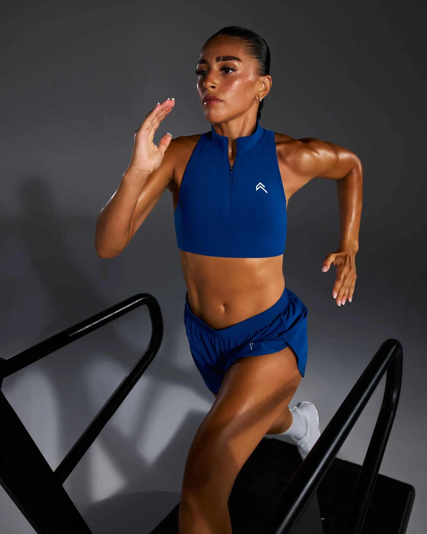 EasyLift™ Zip High Neck Sports Bra with White Logo | Vintage Navy sold by Oner Active