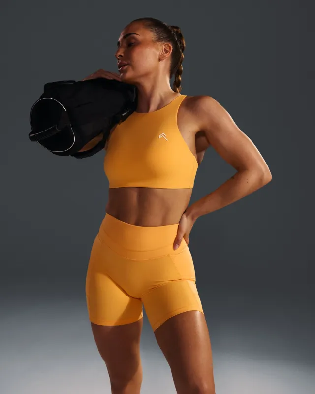 EasyLift™ High Neck Sports Bra with White Logo | Powdered Orange sold by Oner Active