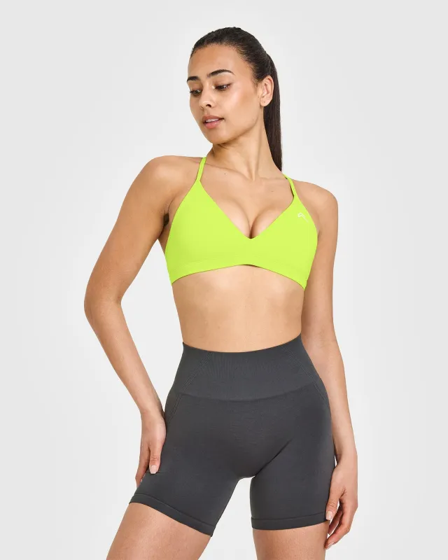 EasyLift™ Ultra Minimal V Neck Bralette with White Logo | Charged Lime Green sold by Oner Active