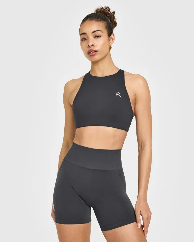 EasyLift™ High Neck Sports Bra with White Logo | Coal sold by Oner Active