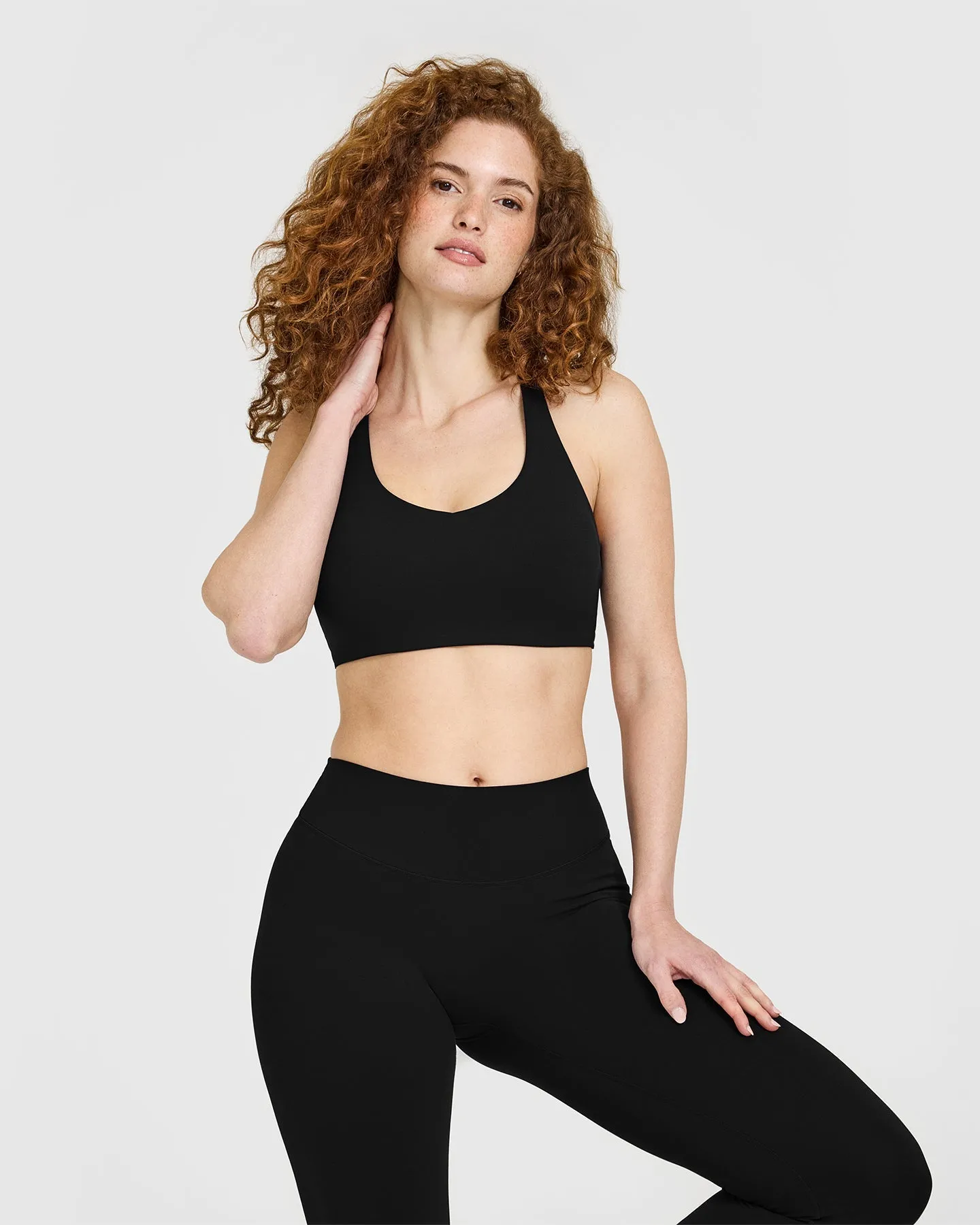 SoftMotion™ Sports Bra with White Logo | Black sold by Oner Active