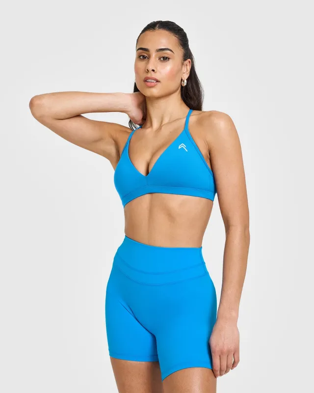 EasyLift™ Ultra Minimal V Neck Bralette with White Logo | Tropical Blue sold by Oner Active