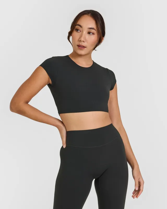 SoftMotion™ Short Sleeve Crop Top with White Logo | Soft Black sold by Oner Active