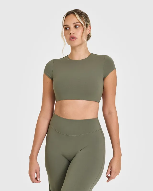 SoftMotion™ Short Sleeve Crop Top with White Logo | Alpine Green sold by Oner Active