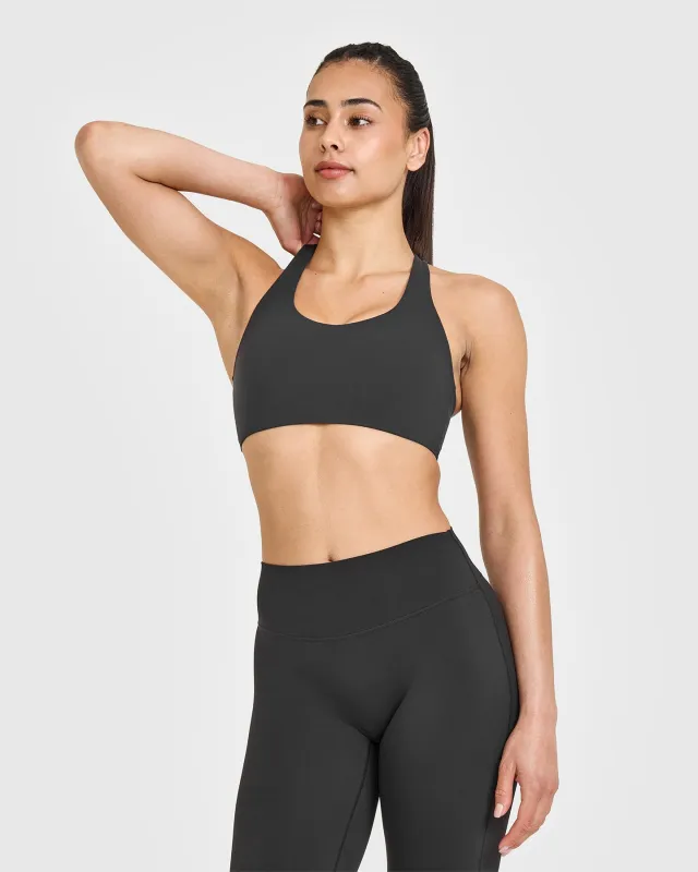 SoftMotion™ Sports Bra with White Logo | Soft Black sold by Oner Active
