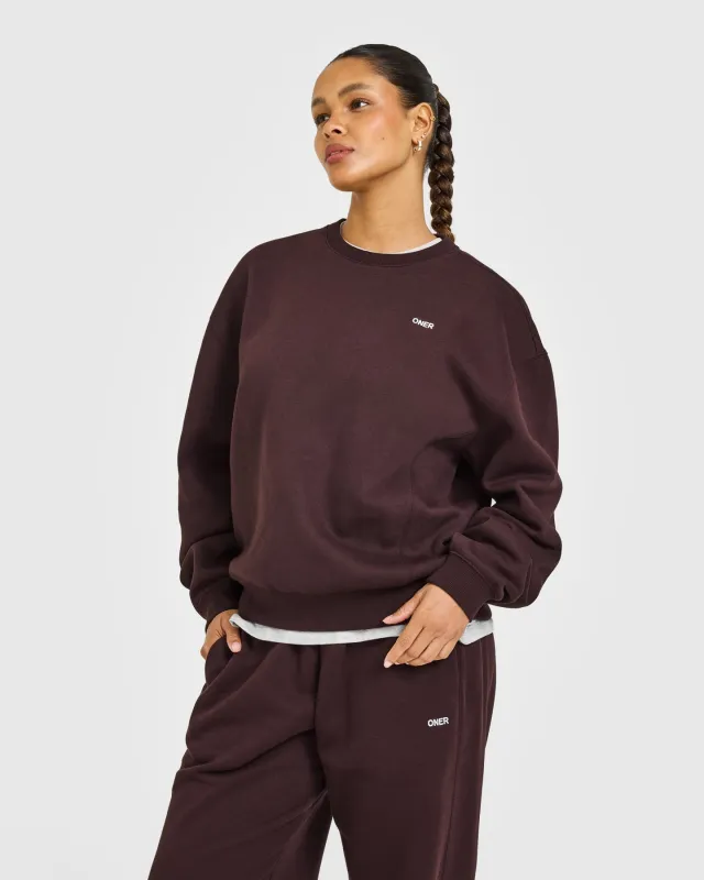 Foundations Crew Neck Sweatshirt with Grey Logo | Plum Brown sold by Oner Active