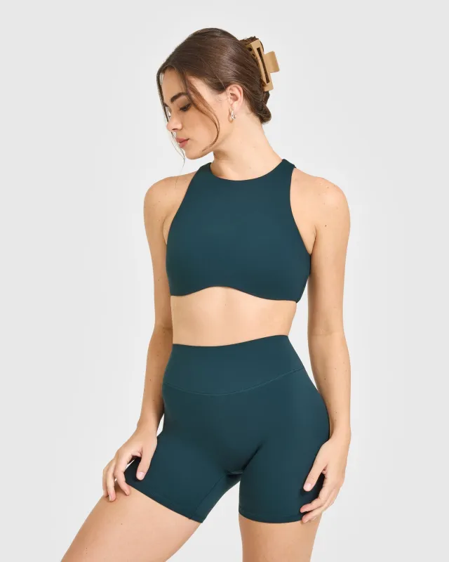 SoftMotion™ High Neck Sports Bra with White Logo | Oil Blue sold by Oner Active