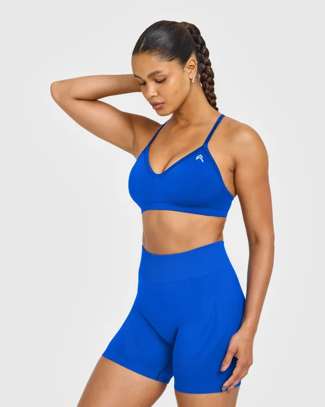 EnhanceLift™ Seamless Strappy Sports Bra with White Logo | Cobalt Blue sold by Oner Active