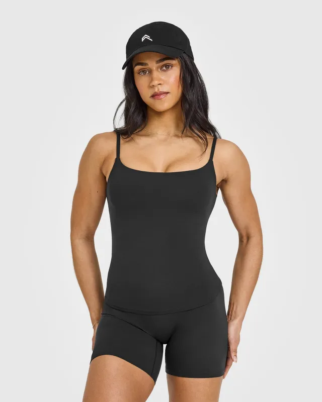 SoftMotion™ Strappy Vest with Built in Bra Shelf with White Logo | Soft Black sold by Oner Active