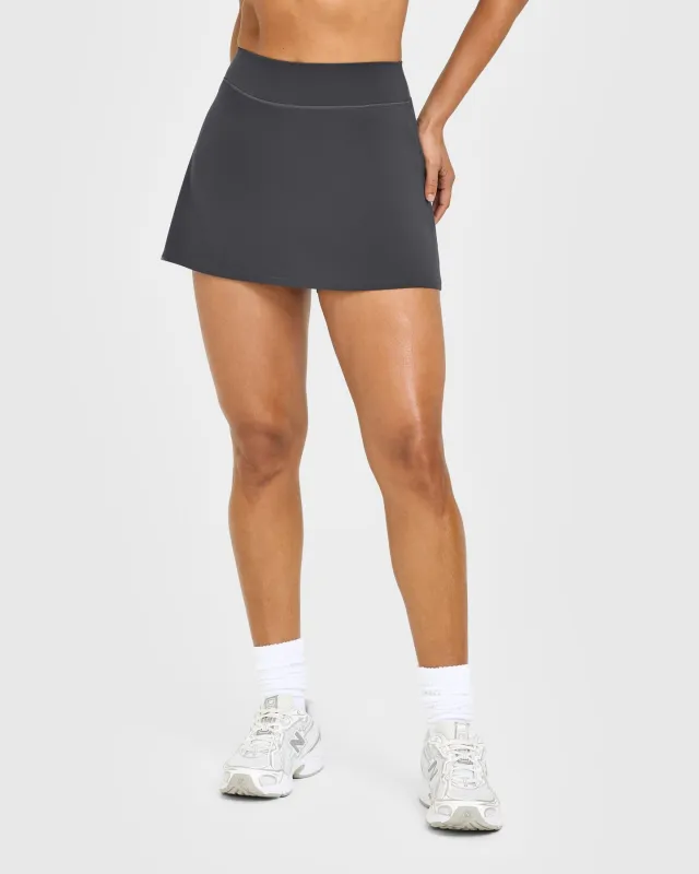 SoftMotion™ Skort with White Logo | Coal sold by Oner Active