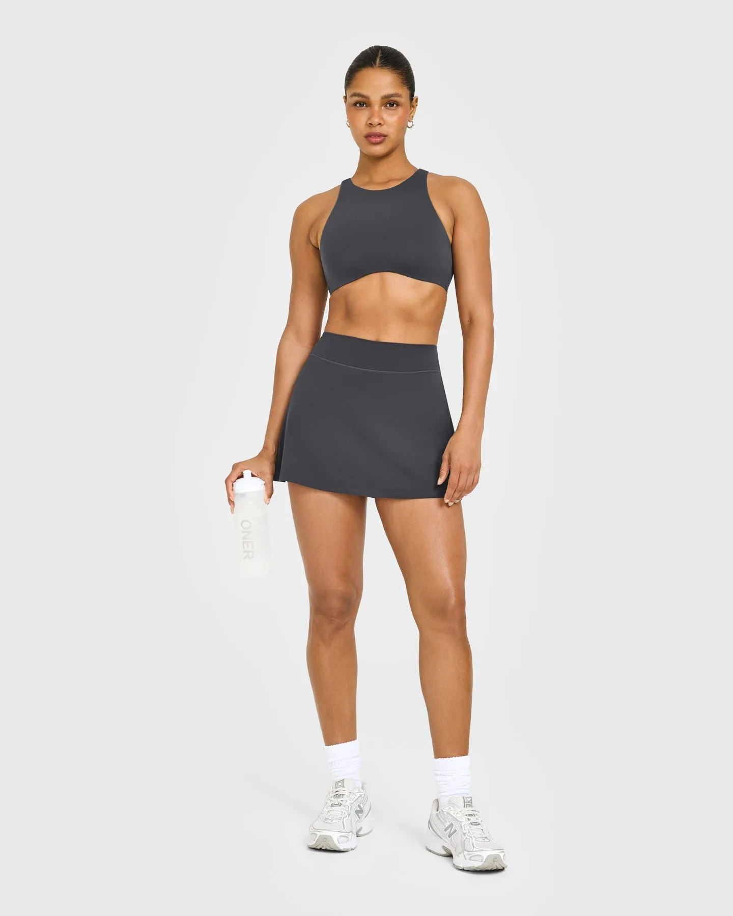 SoftMotion™ High Neck Sports Bra with White Logo | Coal sold by Oner Active product image thumbnail 3