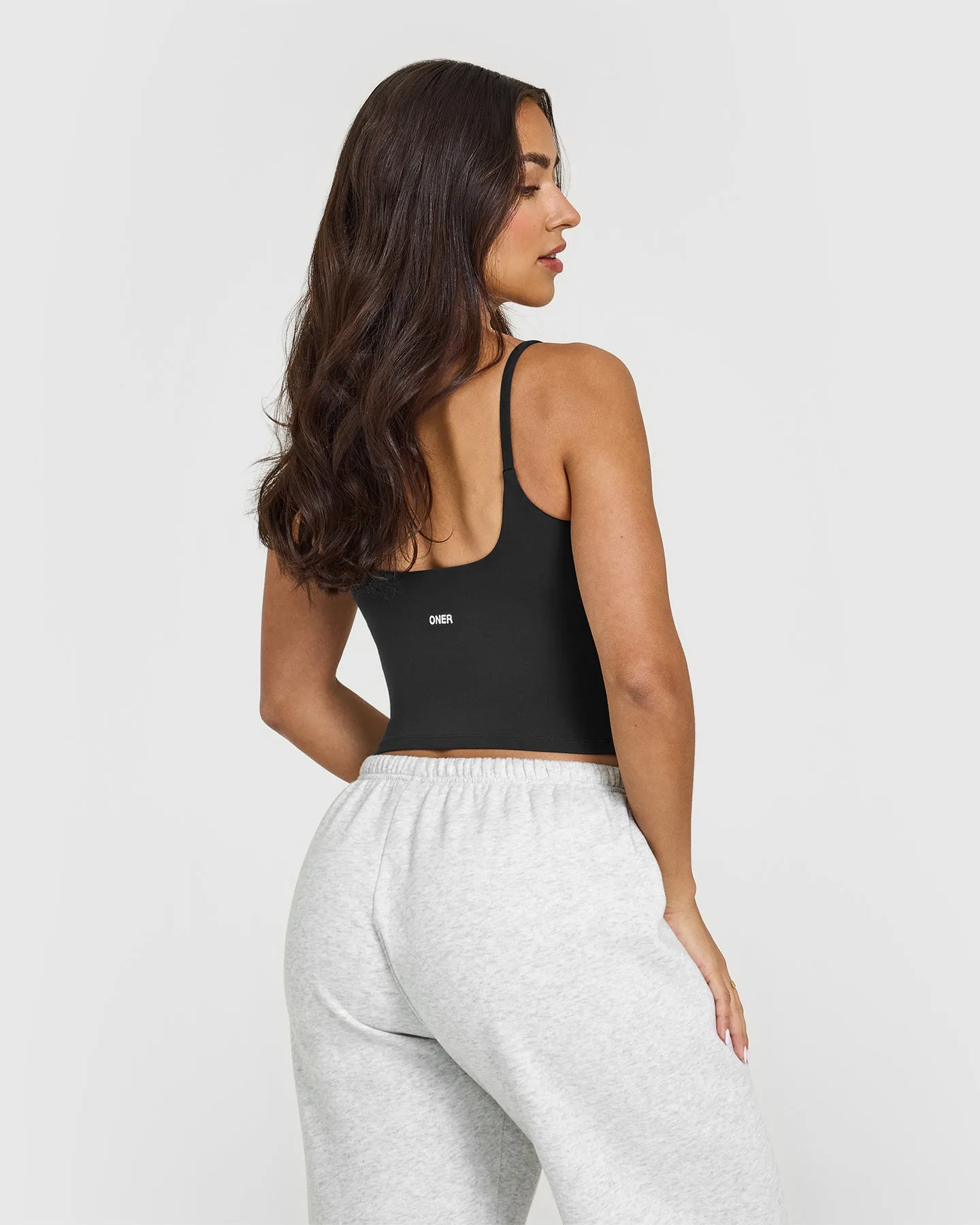 SoftMotion™ Strappy Mid Vest with Built in Bra Shelf with White Logo | Soft Black sold by Oner Active product image thumbnail 2