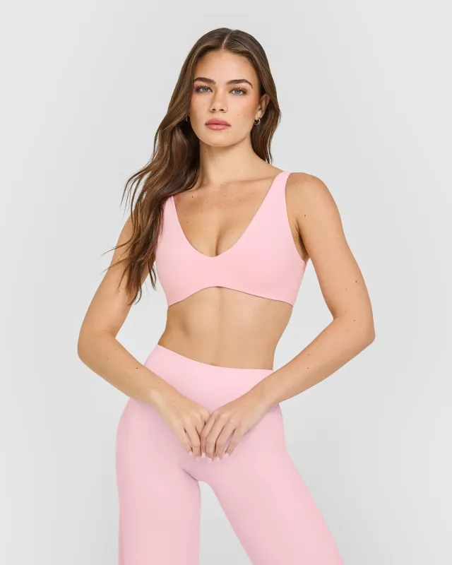 SoftMotion™ Scoop Back Bralette with White Logo | Cherry Blossom Pink sold by Oner Active