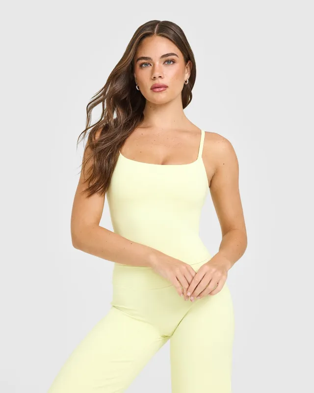 SoftMotion™ Strappy Mid Vest with Built in Bra Shelf | Pastel Yellow sold by Oner Active