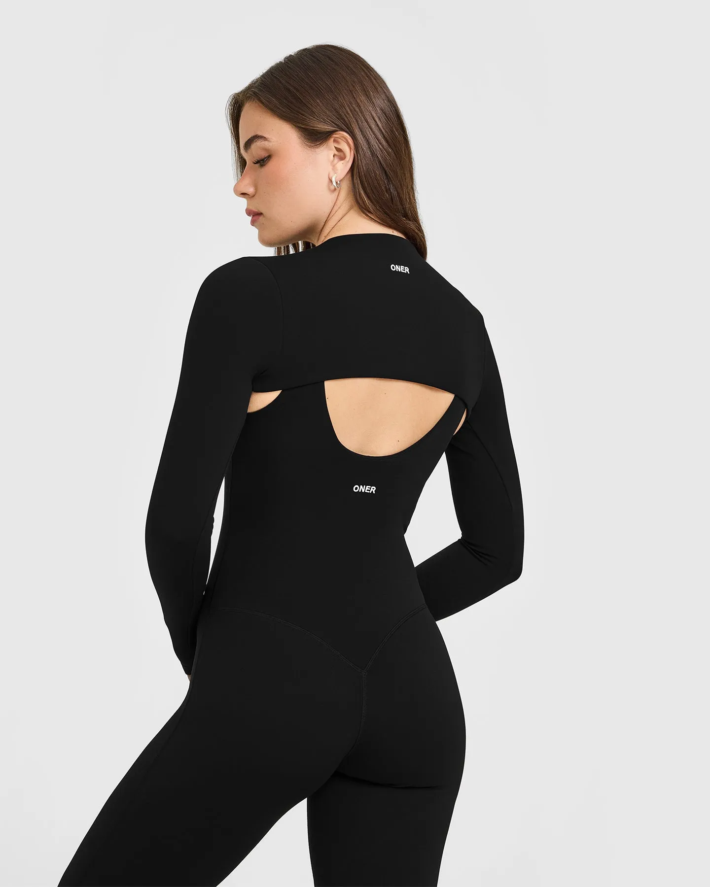 SoftMotion™ Shrug Cover with White Logo | Black sold by Oner Active product image thumbnail 2