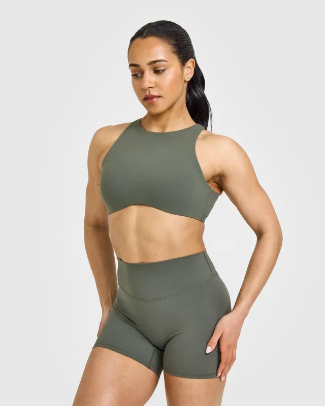 SoftMotion™ High Neck Sports Bra with White Logo | Dark Khaki sold by Oner Active