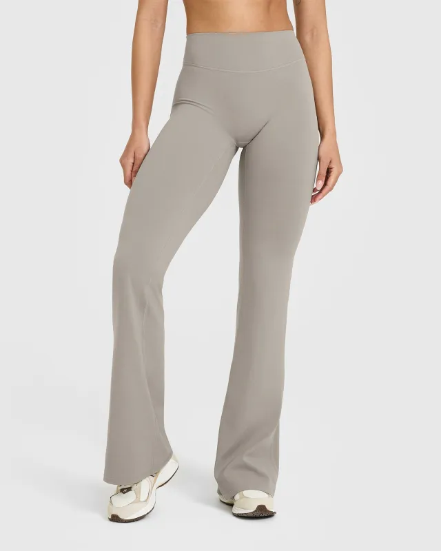 SoftMotion™ Flared Bottoms with White Logo | Warm Sand sold by Oner Active