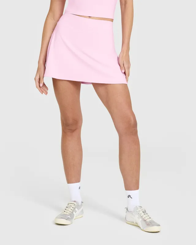 SoftMotion™ Skort with White Logo | Chalk Pink sold by Oner Active