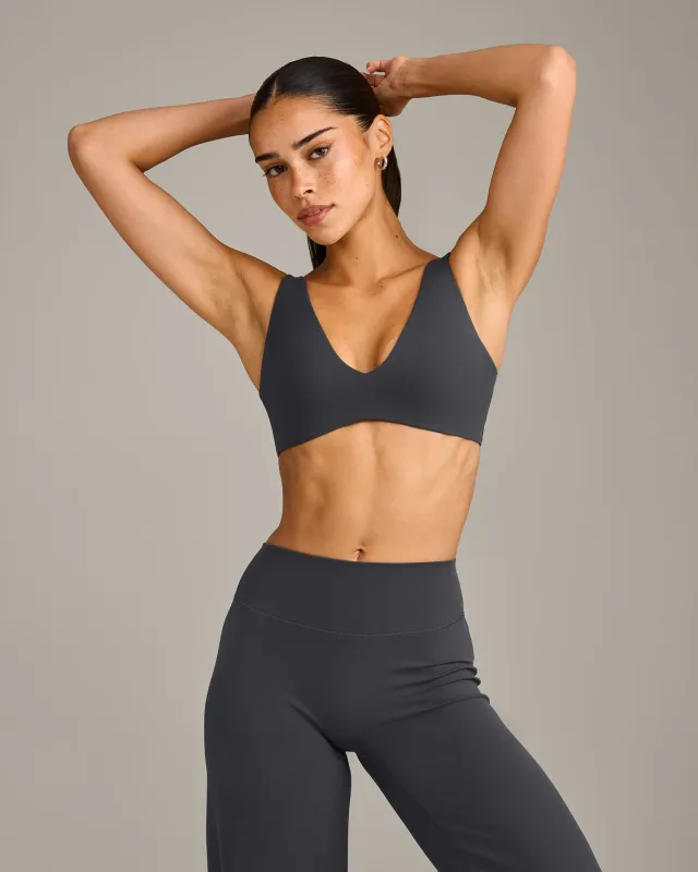 SoftMotion™ Scoop Back Bralette with Grey Logo | Coal sold by Oner Active