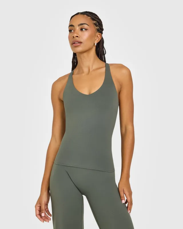 SoftMotion™ Racer Back Vest with Built in Bra Shelf with White Logo | Dark Khaki sold by Oner Active