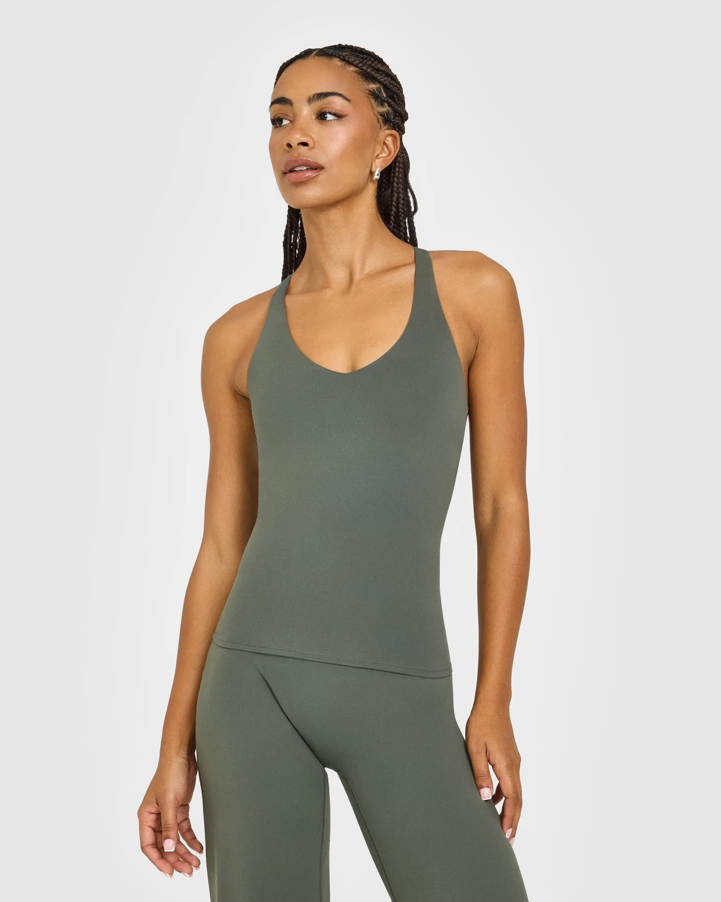 SoftMotion™ Racer Back Vest with Built in Bra Shelf with White Logo | Dark Khaki sold by Oner Active