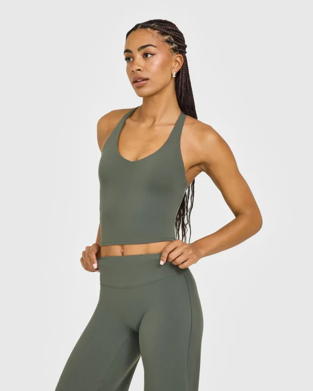 SoftMotion™ Racer Back Mid Vest with Built in Bra Shelf with White Logo | Dark Khaki sold by Oner Active