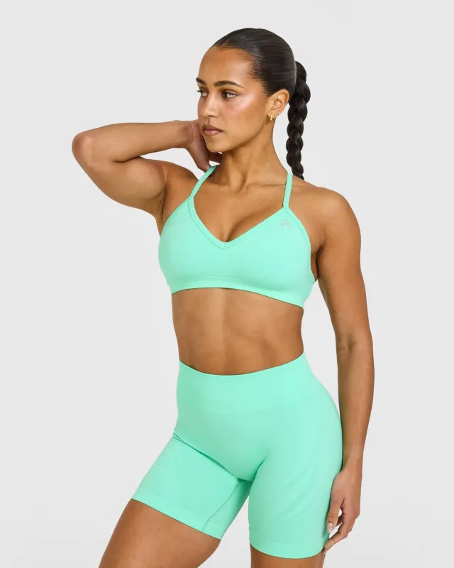 EnhanceLift™ Seamless Strappy Sports Bra with White Logo | Peppermint Green sold by Oner Active
