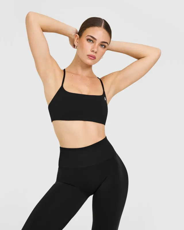 EasyLift™ Strappy Sports Bra with White Logo | Black sold by Oner Active