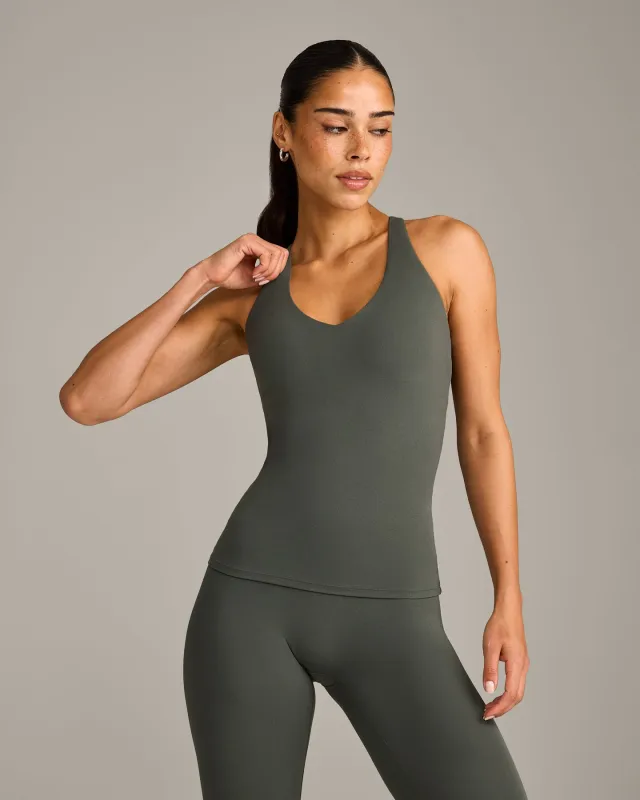 SoftMotion™ Racer Back Vest with Built in Bra Shelf with Grey Logo | Dark Khaki sold by Oner Active