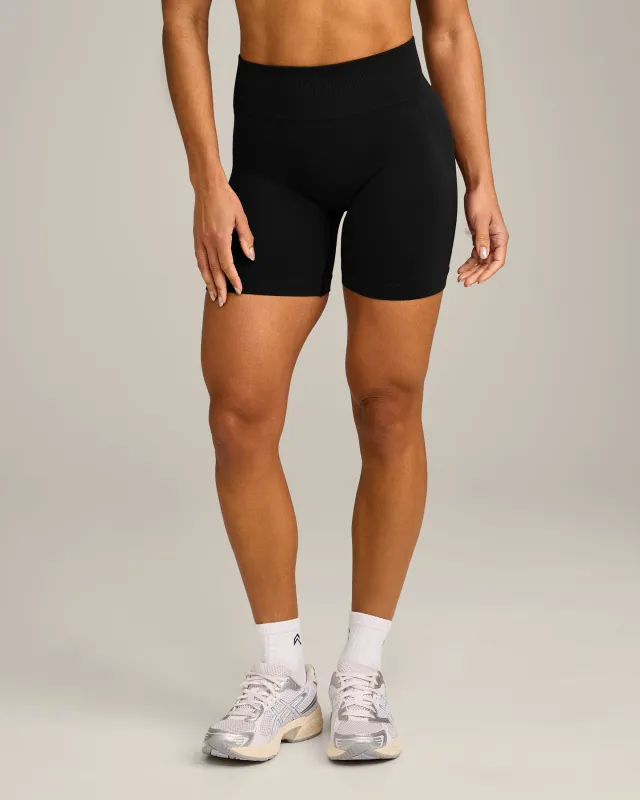 EffortlessLift™ Seamless Mid Rise Shorts with Grey Logo | Black made by Oner Active