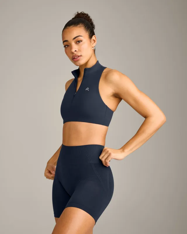 EasyLift™ Zip High Neck Sports Bra with Grey Logo | True Blue made by Oner Active