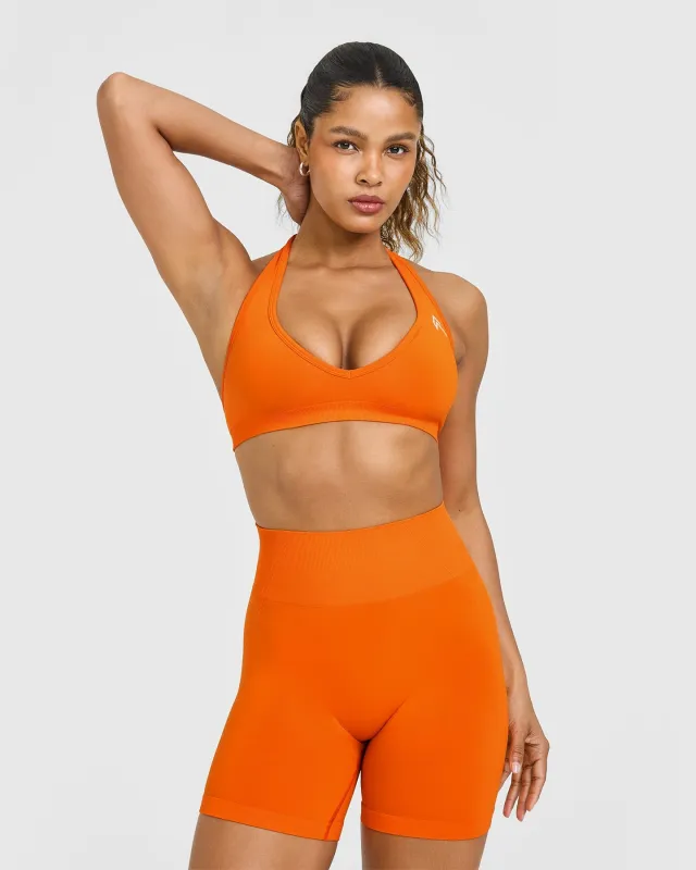 EffortlessLift™ Seamless Halter Neck Sports Bra with White Logo | Flame Orange sold by Oner Active